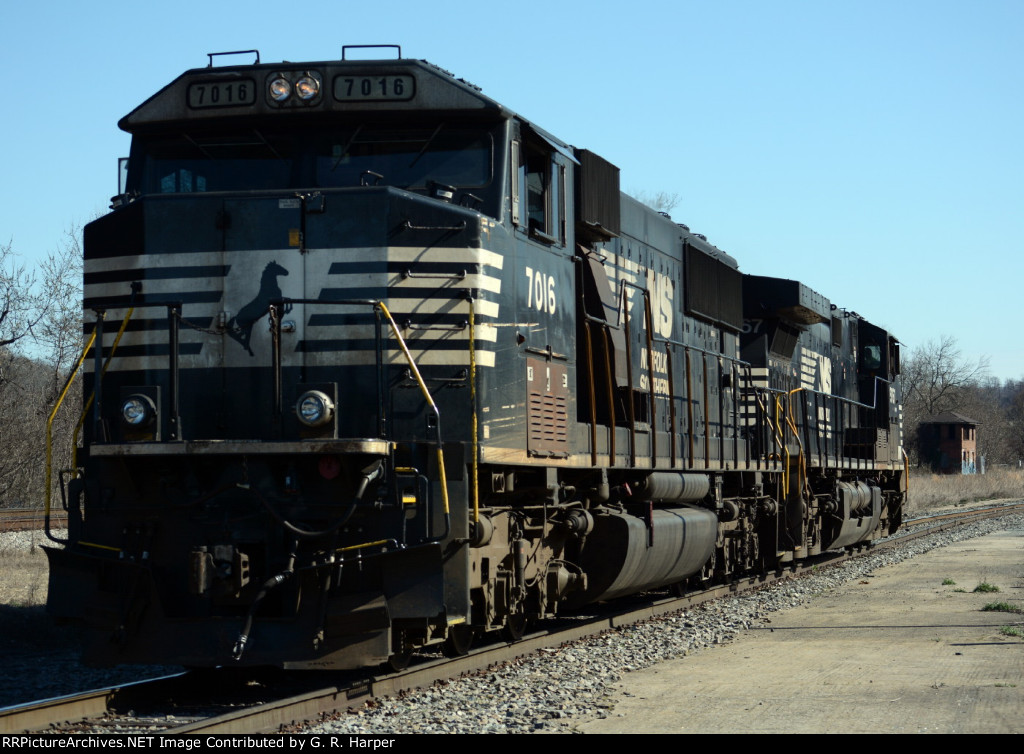 A going away shot of NS yard job E19's units with ND Cabin in the background.